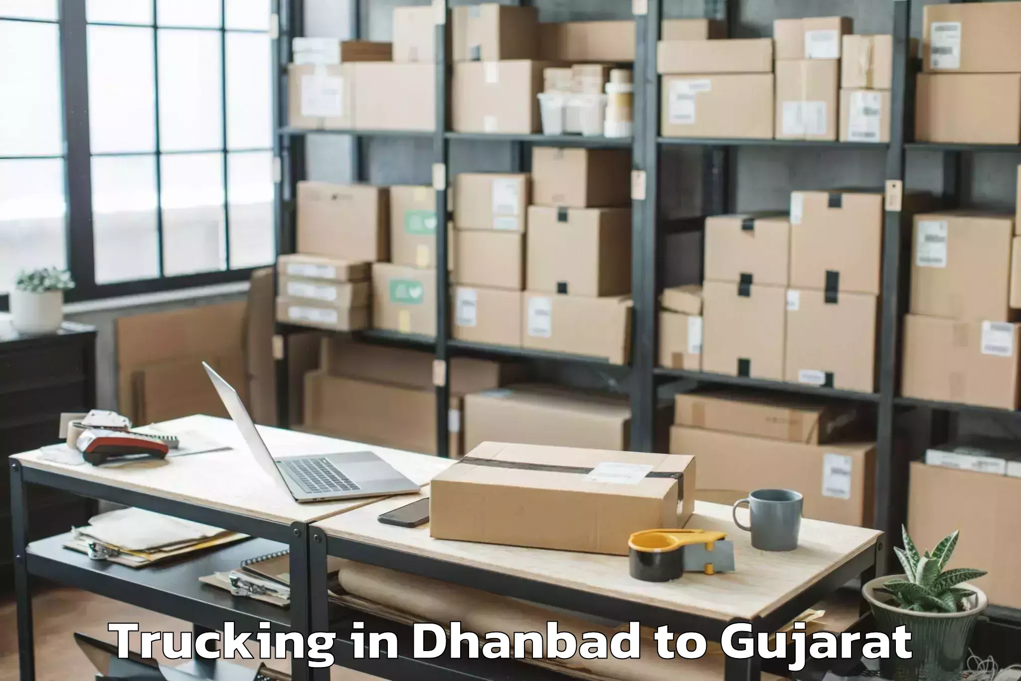 Quality Dhanbad to Vyara Trucking